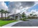 Community clubhouse with beautiful landscaping and parking at 10612 Strawberry Tetra Dr, Riverview, FL 33578