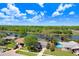 Aerial view of a home with a swimming pool near a picturesque canal at 10790 92Nd St, Seminole, FL 33777