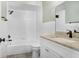 Nicely updated bathroom with white tile and newer vanity at 10790 92Nd St, Seminole, FL 33777