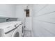 Laundry room featuring a Samsung washer and dryer at 10790 92Nd St, Seminole, FL 33777