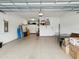 Clean, organized two-car garage with epoxy floors offering ample space for storage and vehicles at 11248 Juglans Dr, Odessa, FL 33556