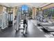 Well-equipped gym with treadmills, elliptical machines, and weight training stations at 11248 Juglans Dr, Odessa, FL 33556