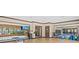 Well-equipped gym with mirrored walls and natural light. Offers the perfect spot to meet your health goals at 11248 Juglans Dr, Odessa, FL 33556
