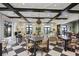 Stylish clubhouse featuring elegant decor, comfortable seating areas, and an open floor plan at 11327 Emerald Shore Dr, Riverview, FL 33579