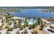 The community features a large pool area, clubhouse, parking, and waterfront views, creating a luxurious living experience at 11327 Emerald Shore Dr, Riverview, FL 33579