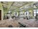 Well-equipped gym featuring multiple weight machines, treadmills, and other exercise equipment at 11327 Emerald Shore Dr, Riverview, FL 33579