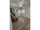 Bedroom featuring hardwood floors, a ceiling fan, and natural light at 1200 Abbey Crescent Ln, Clearwater, FL 33759