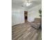 Bedroom featuring hardwood floors, a ceiling fan, and natural light at 1200 Abbey Crescent Ln, Clearwater, FL 33759