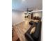 Spacious open-concept living space with a modern kitchen, dining area, and living room at 1200 Abbey Crescent Ln, Clearwater, FL 33759