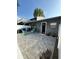 Back patio featuring pavers, a privacy fence, and patio furniture at 1200 Abbey Crescent Ln, Clearwater, FL 33759