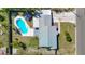 Enjoy this bird's eye view of the pool, backyard, home and patio at 1209 W Camellia Dr, Brandon, FL 33510