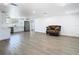 Bright and open living space with stylish flooring and freshly painted walls at 1209 W Camellia Dr, Brandon, FL 33510