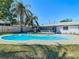 Relax in the backyard pool or enjoy the screened in lanai attached to this charming single Gathering home at 1209 W Camellia Dr, Brandon, FL 33510