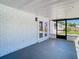 Spacious screened porch perfect for outdoor lounging and entertaining at 1209 W Camellia Dr, Brandon, FL 33510
