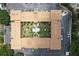 Aerial view of the multi Gathering structure with an outdoor pool area and manicured grounds at 12760 Indian Rocks Rd # 579, Largo, FL 33774