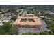 Aerial view of the multi Gathering structure featuring a courtyard pool and beautifully landscaped grounds at 12760 Indian Rocks Rd # 579, Largo, FL 33774
