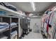 Walk-in closet with organized storage, shelves, and ample hanging space at 12760 Indian Rocks Rd # 579, Largo, FL 33774