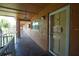 Inviting condo hallway with exterior doors and window, providing natural light and accessibility at 12760 Indian Rocks Rd # 579, Largo, FL 33774