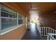 Exterior hallway with covered ceilings and view of the outdoors at 12760 Indian Rocks Rd # 579, Largo, FL 33774