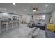 Spacious living room featuring tile floors, recessed lighting, and an open layout at 12760 Indian Rocks Rd # 579, Largo, FL 33774