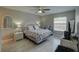 Serene bedroom featuring a woven bed frame and furniture set, with neutral tones at 12760 Indian Rocks Rd # 579, Largo, FL 33774