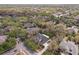 Serene neighborhood featuring a home nestled among mature trees, offering a sense of privacy and tranquility at 16113 Ternglade Dr, Lithia, FL 33547