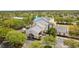 Aerial view showcases the community's clubhouse, featuring manicured grounds, and ample parking at 16113 Ternglade Dr, Lithia, FL 33547