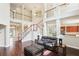 Bright, open-concept living area with a view of the staircase and kitchen at 16113 Ternglade Dr, Lithia, FL 33547