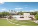 Charming Park Square with lush lawn seating, beautiful storefronts, and serene water fountain in the heart of the community at 16113 Ternglade Dr, Lithia, FL 33547