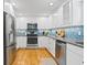 Bright kitchen features stainless steel appliances, and a stylish backsplash at 1617 Oak Ne St, St Petersburg, FL 33704