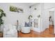 Bright living room featuring built-in shelving, hardwood floors, and comfortable seating at 1617 Oak Ne St, St Petersburg, FL 33704