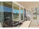 Balcony with seating and scenic views at 223 Island Way # 2C, Clearwater Beach, FL 33767