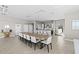 Spacious dining and kitchen area with modern decor and plenty of natural light at 223 Island Way # 2C, Clearwater Beach, FL 33767