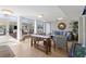 Bright lobby with comfortable seating, stone accent wall, tiled floor, and lots of natural light at 223 Island Way # 2C, Clearwater Beach, FL 33767