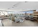 Bright lounge area with comfortable seating, large windows and a view of the water at 223 Island Way # 2C, Clearwater Beach, FL 33767