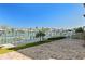 Waterfront patio with a beautiful view of the boat docks and canal, perfect for relaxing at 223 Island Way # 2C, Clearwater Beach, FL 33767