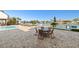 Outdoor pool area with patio seating, perfect for relaxation and enjoying waterfront views at 223 Island Way # 2C, Clearwater Beach, FL 33767