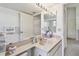 Bright bathroom featuring large mirror and updated fixtures at 2291 Americus W Blvd # 23, Clearwater, FL 33763