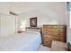 Relaxing bedroom with ceiling fan and dresser at 2291 Americus W Blvd # 23, Clearwater, FL 33763