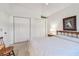 Comfortable bedroom featuring double closets, providing ample storage at 2291 Americus W Blvd # 23, Clearwater, FL 33763