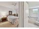 View from the bedroom looking into a bright and clean bathroom at 2291 Americus W Blvd # 23, Clearwater, FL 33763