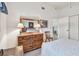 Bedroom with dresser and large mirror, next to doorway at 2291 Americus W Blvd # 23, Clearwater, FL 33763