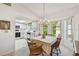 Bright dining area with chandelier, adjacent to the kitchen at 2291 Americus W Blvd # 23, Clearwater, FL 33763