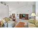 Spacious living room flowing into dining area and bedroom at 2291 Americus W Blvd # 23, Clearwater, FL 33763