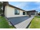 Backyard with large deck perfect for outdoor entertaining and relaxation at 3334 Pineview Dr, Holiday, FL 34691