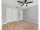 Cozy bedroom showcasing a closet and a ceiling fan providing ample storage and comfort at 3334 Pineview Dr, Holiday, FL 34691