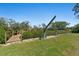 Property with canal access and dock, complete with a boat lift for easy water access at 3334 Pineview Dr, Holiday, FL 34691