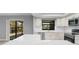 Bright kitchen featuring stainless appliances, granite countertops, and a subway tile backsplash at 3334 Pineview Dr, Holiday, FL 34691
