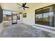 Screened lanai with sliding glass doors perfect for enjoying the outdoors in comfort at 3334 Pineview Dr, Holiday, FL 34691