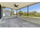 Spacious screened lanai offers relaxing views and ample space for outdoor living at 3334 Pineview Dr, Holiday, FL 34691